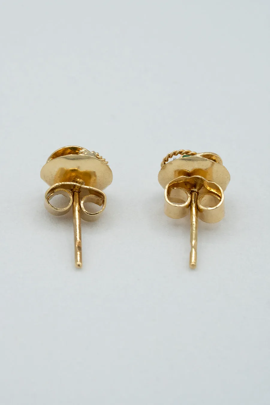 Emerald, 18-karat gold, Colombian emerald and gold flower stud earrings